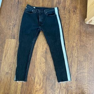 Levi’s black jeans with white stripe on the side